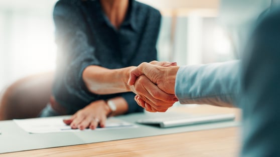Handshake, deal and business people in office with agreement