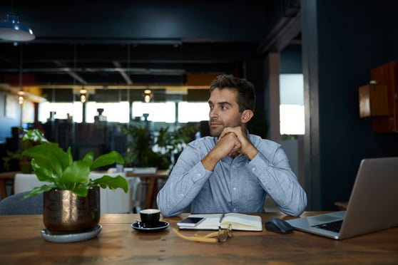 Businessman working at a desk in quiet office