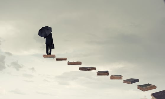 Person walking up stairs that end