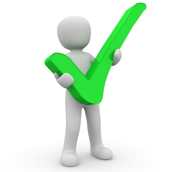 Person icon holding a green checkmark